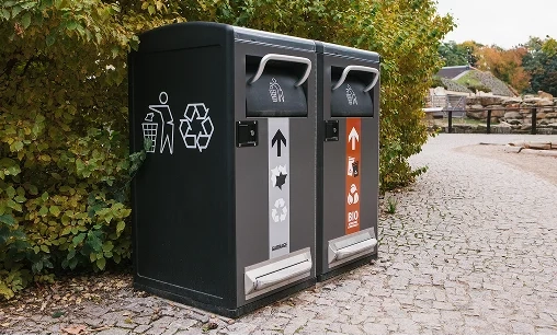A dust bin with a biodegradable waste compartment promoting sustainability